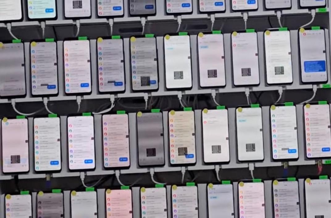 rack of phones fraud scam darcula magic cat