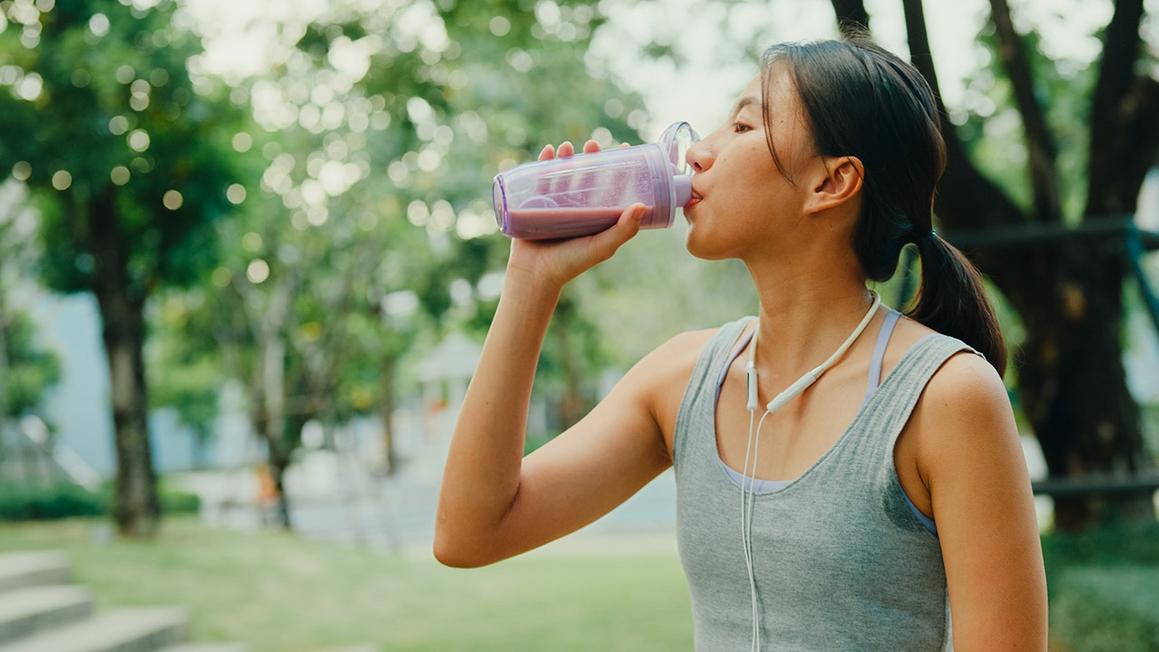 woman clear protein shake workout