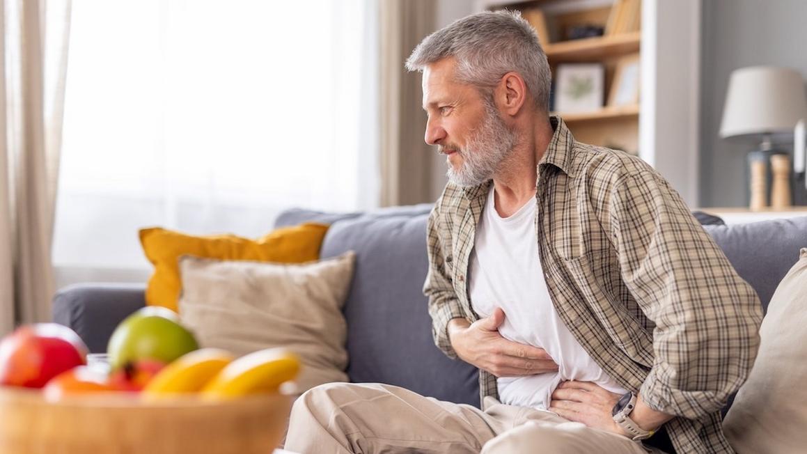 man with stomach pain