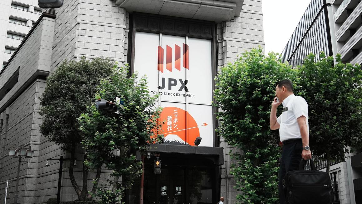 Cổ phiếu châu Á đa số tăng sau ngày giao dịch đầy biến động trên Phố Wall 1