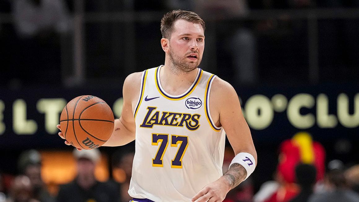 lakers luka doncic dribbles the ball