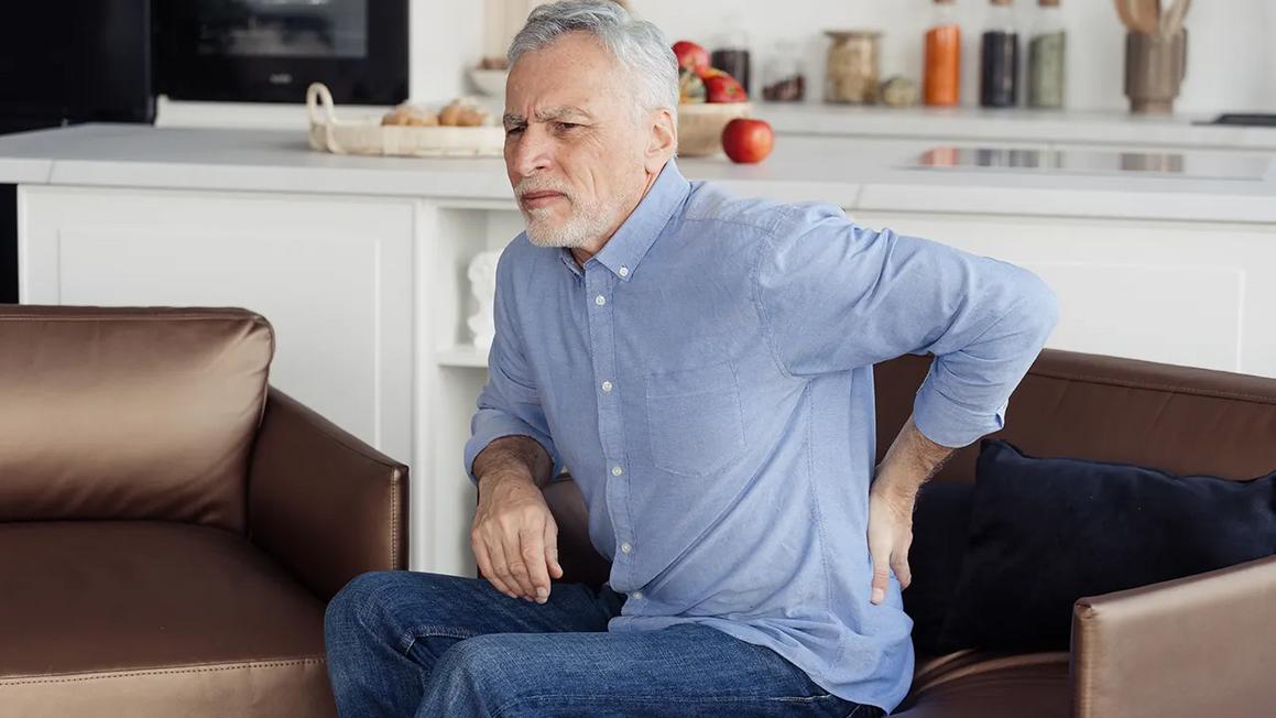man lower back kidney pain