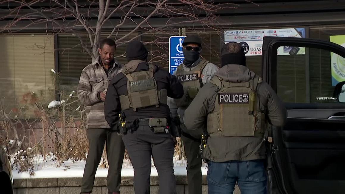 Tin Nóng: Các Hoạt Động Thực Thi Luật Di Trú Được Cho Là Bắt Đầu Tại Minneapolis 1 12 2 russ 2 men detained by ice raw broll 00.01.45.14