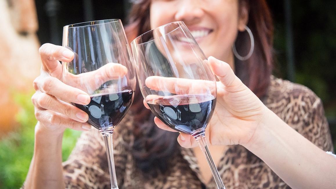 WineGlassHoldingIstock