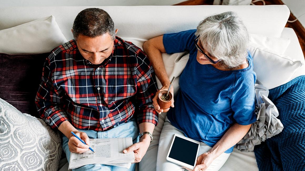 couple doing crosswords