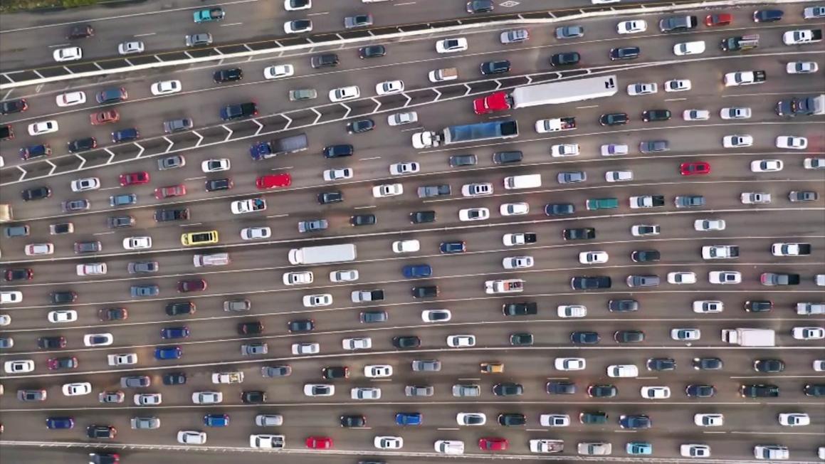 drone shot wide traffic on highway
