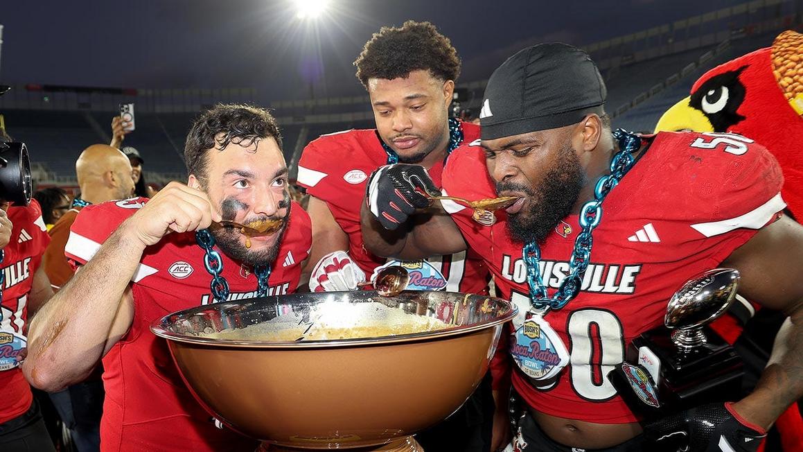 louisville players eat beans after win