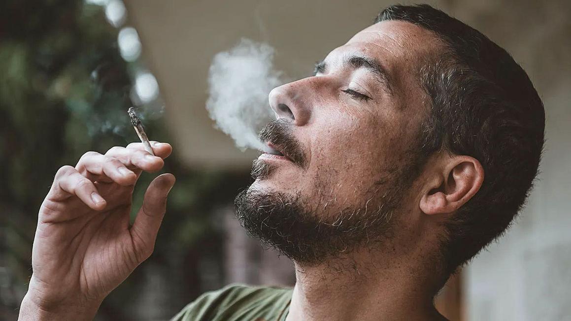 man smoking marijuana istock