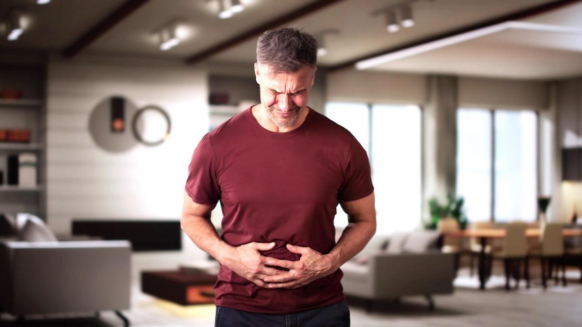 man with stomach pain