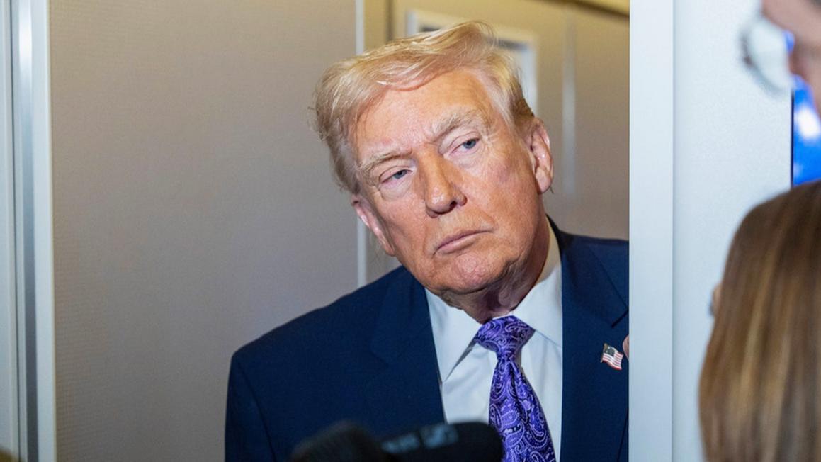 trump press gaggle air force one asylum