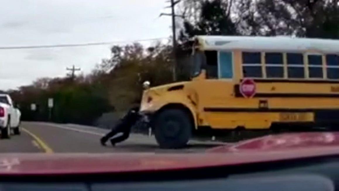 watch superman police officer moves bus