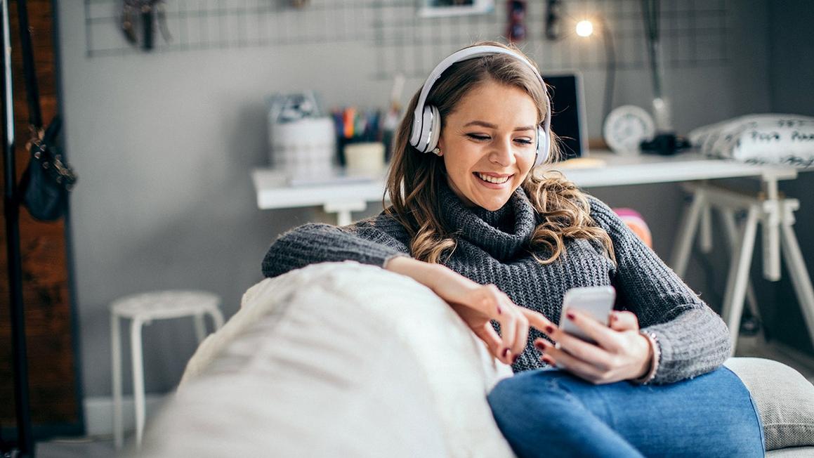 woman listening to podcast