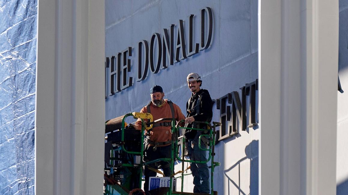 workers forklift the donald kennedy center