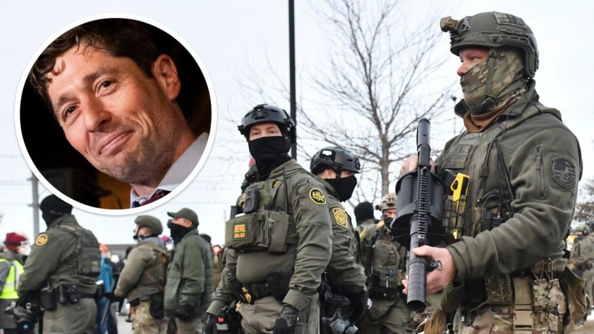 Mayor Jacob Frey with federal agents after shooting in Minnesota