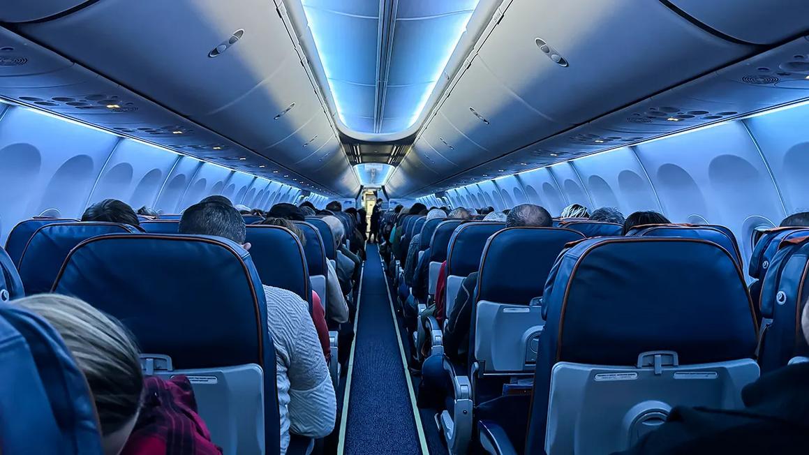 airplane interior with people seated