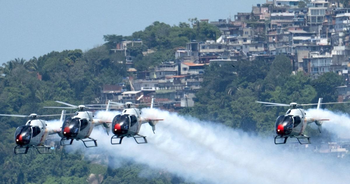Trình diễn máy bay trực thăng Không quân Tây Ban Nha gây kinh ngạc du khách tại bãi biển Rio 1 f vert brk lon helicopters 260128 b2w1fh