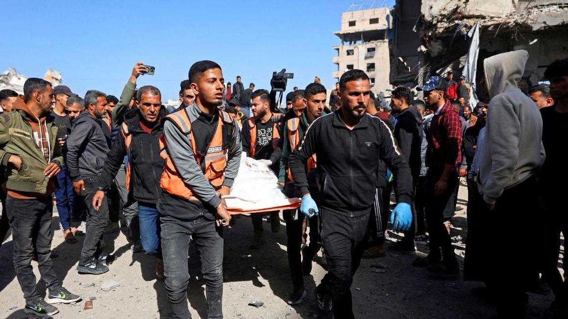 gaza police station airstrike body carried