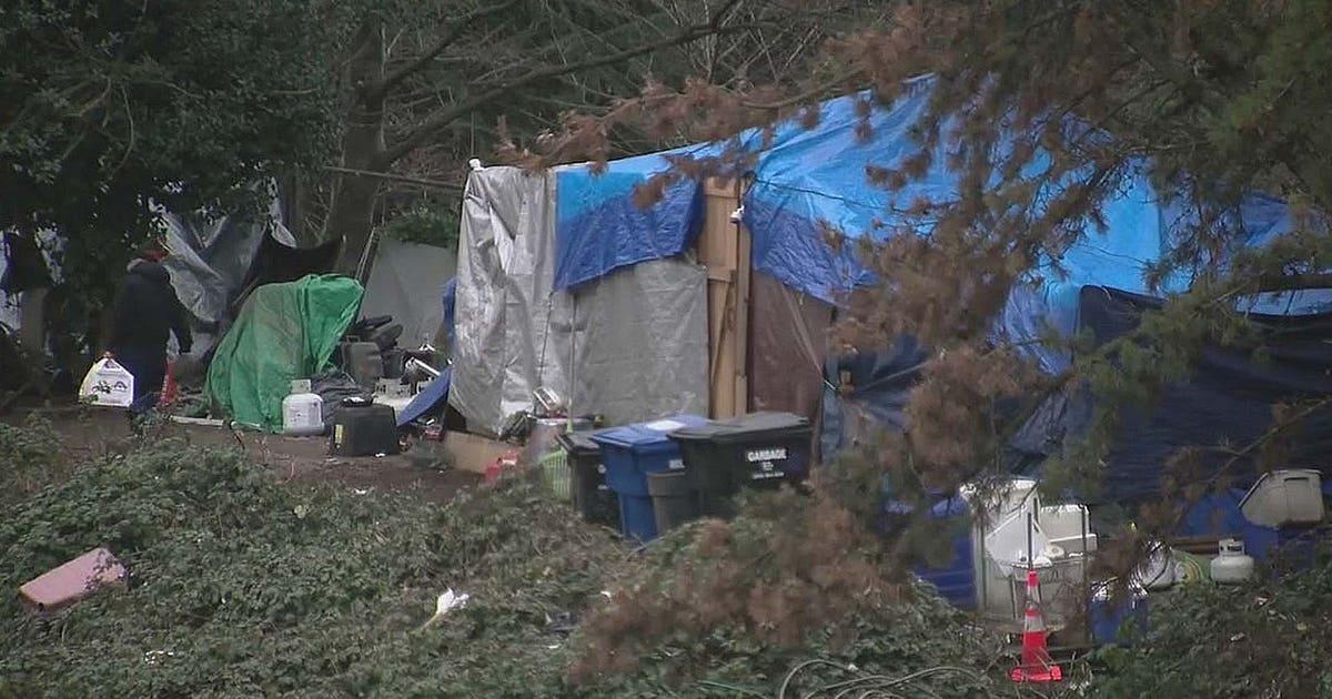 homeless encampment highway camp generic