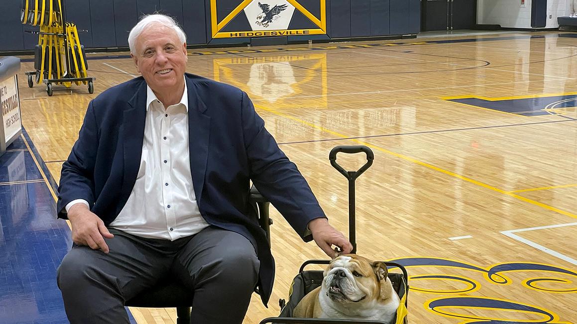 jim justice and babydog on the court 1