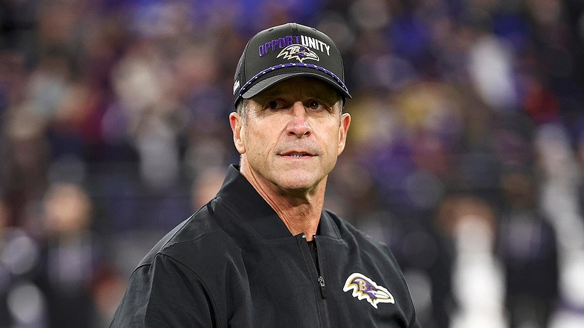 john harbaugh looks on ravens patriots