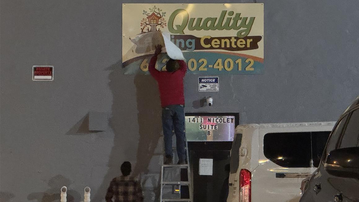 quality learning sign being fixed minneapolis