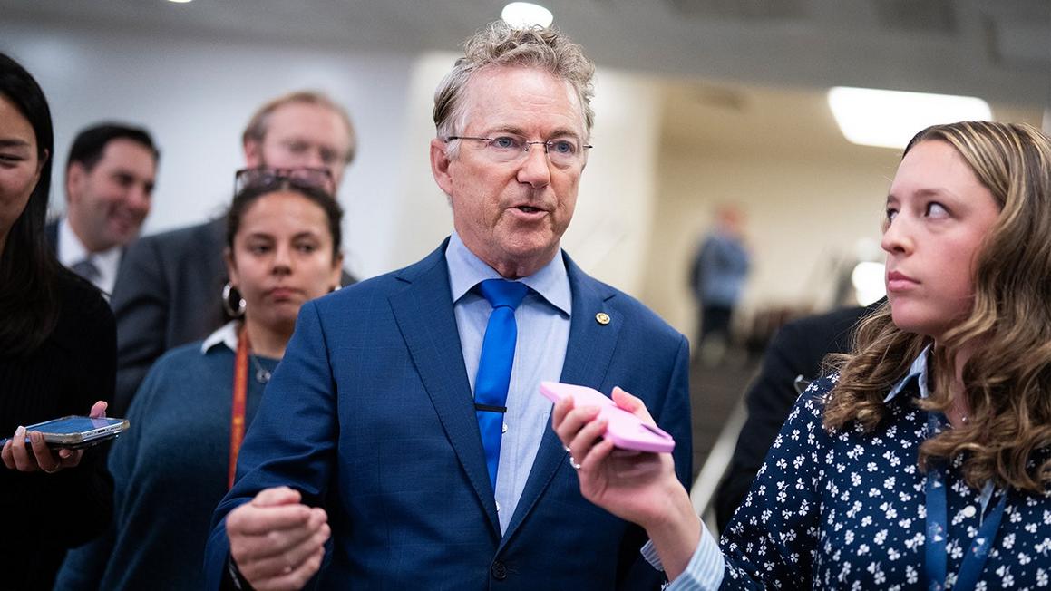 rand paul speaks to reporters in senate basement