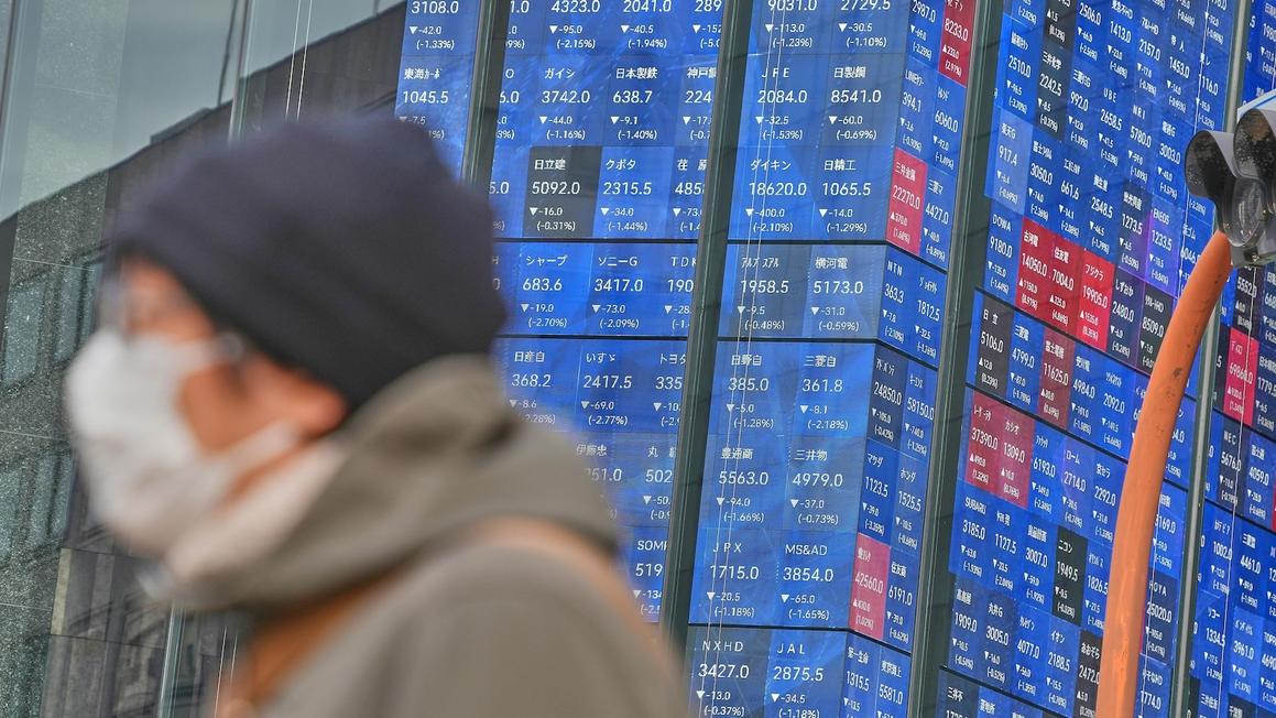 Thị trường chứng khoán châu Á trái chiều, USD tiếp tục giảm giá 1