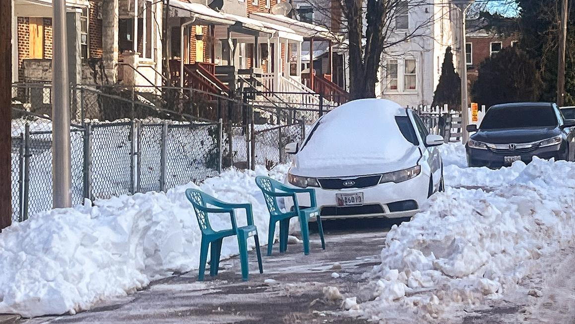 chairs blocking road spot snow storm