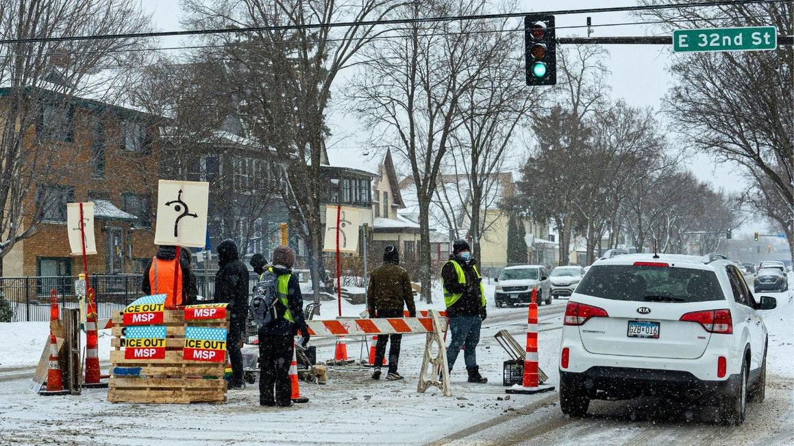minneapolis anti ice neighborhood checkpoint barricade feb 2026
