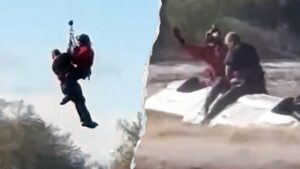 Phi hành đoàn trực thăng cảnh sát Arizona giải cứu người đàn ông mắc kẹt trên nóc xe tải bị nước lũ cuốn trôi